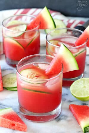 Three Watermelon Elderflower Cocktails Garnished with Watermelon Slices