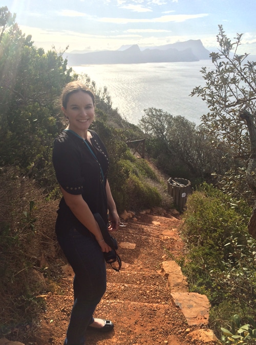 Author walking along path to the point