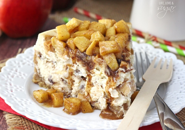 Apple Cinnamon Cheesecake - A cinnamon cheesecake layered with apples and cinnamon filling! Topped with even more apples and cinnamon! Absolutely to die for!