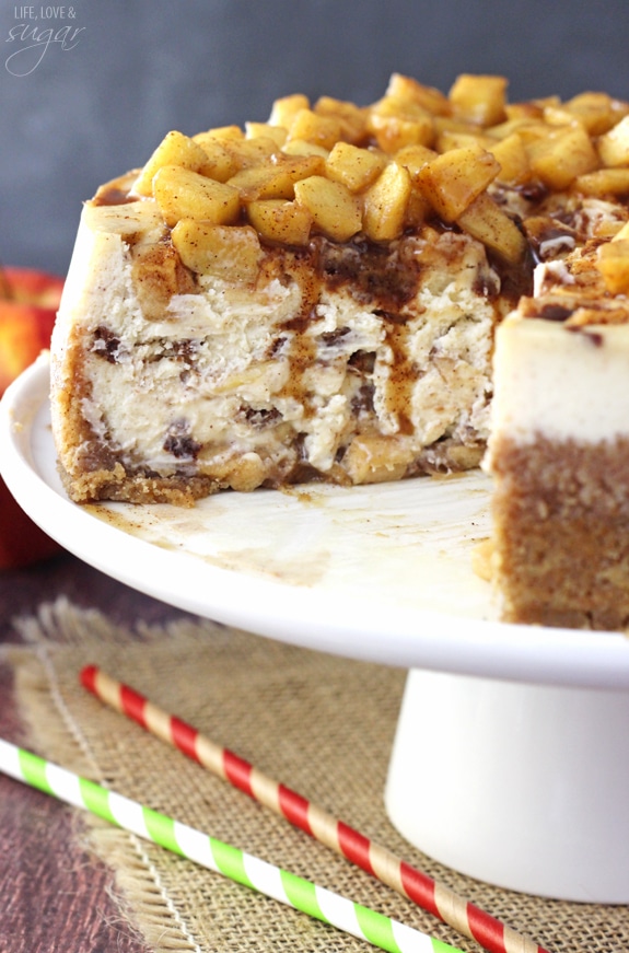 Apple Cinnamon Cheesecake - A cinnamon cheesecake layered with apples and cinnamon filling! Topped with even more apples and cinnamon! Absolutely to die for!