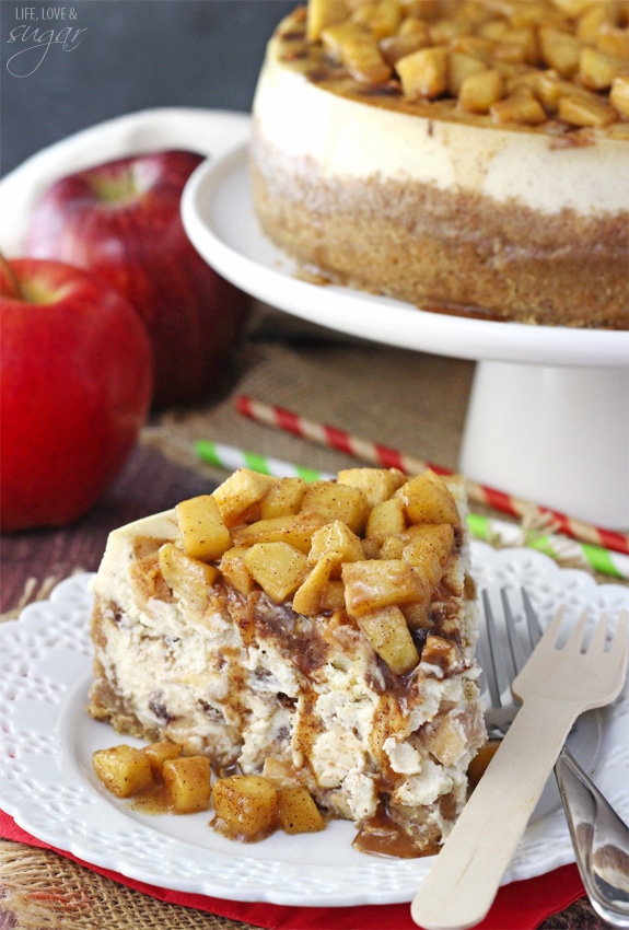 Apple Cinnamon Cheesecake - A cinnamon cheesecake layered with apples and cinnamon filling! Topped with even more apples and cinnamon! Absolutely to die for!