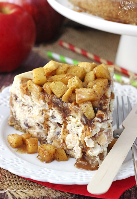 Apple Cinnamon Cheesecake - A cinnamon cheesecake layered with apples and cinnamon filling! Topped with even more apples and cinnamon! Absolutely to die for!