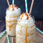 Two mason jars of Caramel Blended Coffee with straws