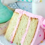 Moist and Fluffy Vanilla Cake slice on white plate 2 close up