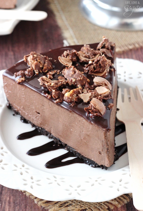 No Bake Nutella Cheesecake - smooth, creamy and amazing! Topped with Nutella ganache and Ferrero Rocher!