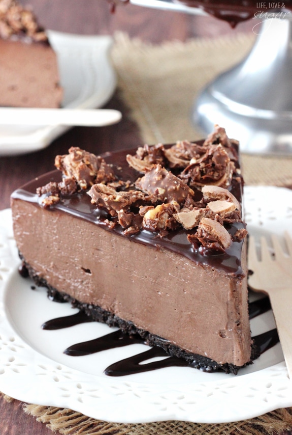 No Bake Nutella Cheesecake - smooth, creamy and amazing! Topped with Nutella ganache and Ferrero Rocher!