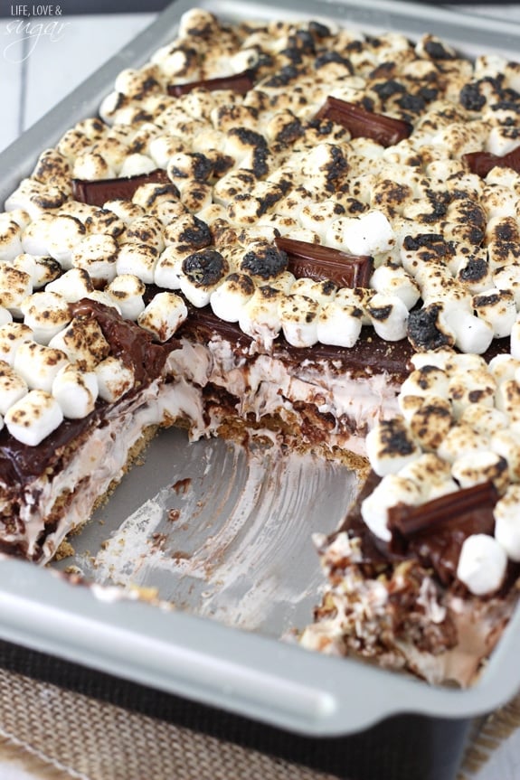 Smores Icebox Cake in a pan with a serving removed