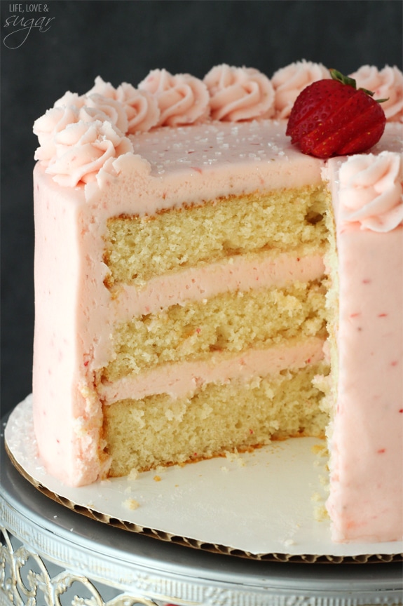 Strawberry Moscato Layer Cake with a slice removed
