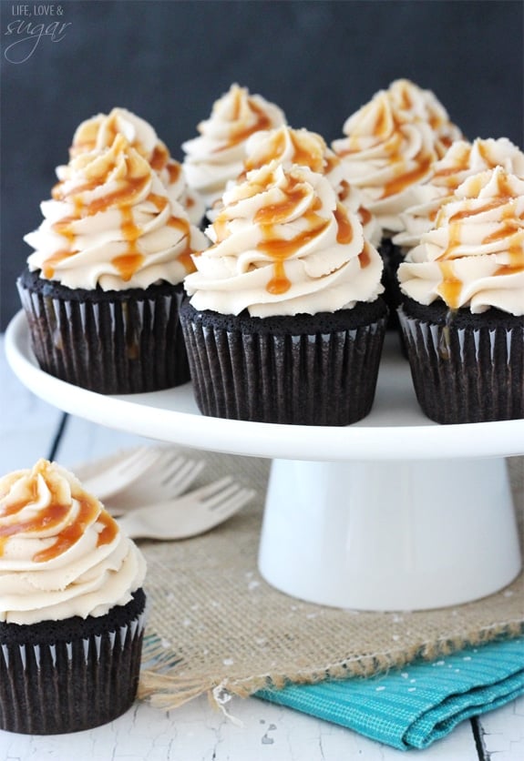 Kahlua Chocolate Cupcakes with a Salted Caramel Drizzle on a cake stand