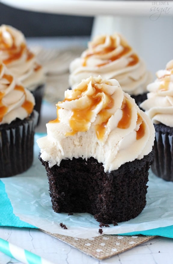 Kahlua Chocolate Cupcakes with a Salted Caramel Drizzle with a bite out of one