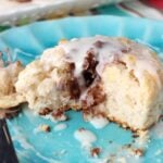 Copycat Bojangles Cinnamon Biscuits on blue plate halved