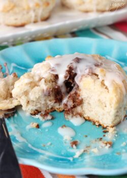 Copycat Bojangles Cinnamon Biscuits on blue plate halved