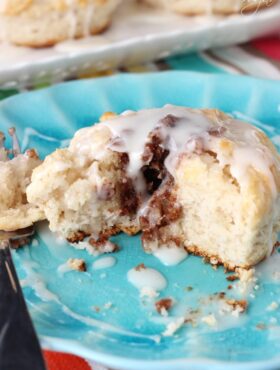 Copycat Bojangles Cinnamon Biscuits on blue plate halved