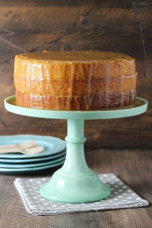 Real Deal Caramel Cake on green stand