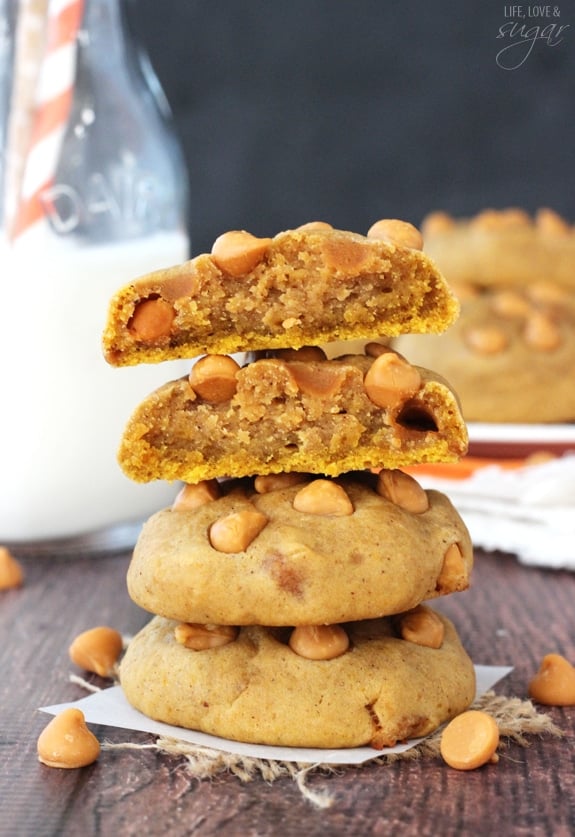 Pumpkin Butterscotch Chip Cookies stacked with two halves on top
