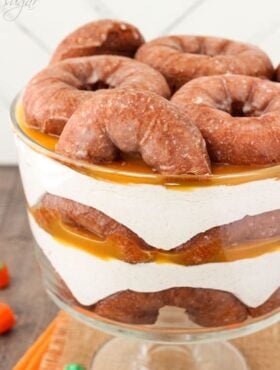 Close-up view of Pumpkin Spice Donut Cheesecake Trifle in a trifle bowl