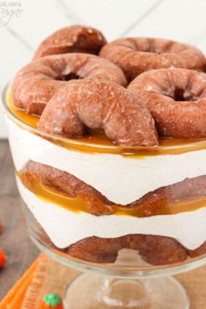 Close-up view of Pumpkin Spice Donut Cheesecake Trifle in a trifle bowl