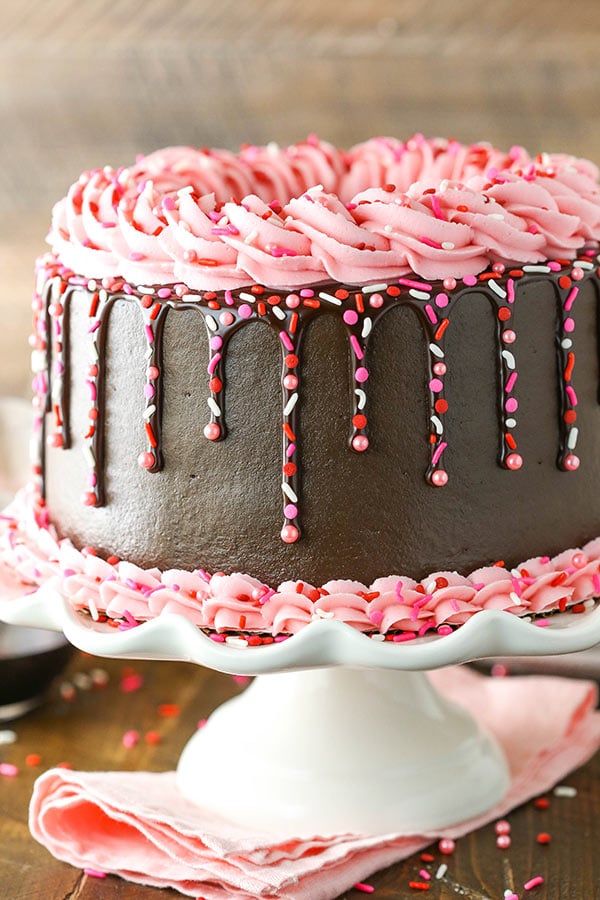 Frosted chocolate cake with pink buttercream.