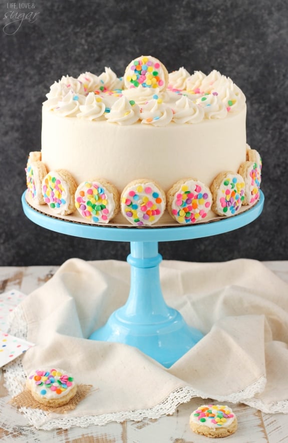 BAILEYS Frosted Vanilla Cookie Layer Cake on a blue cake stand