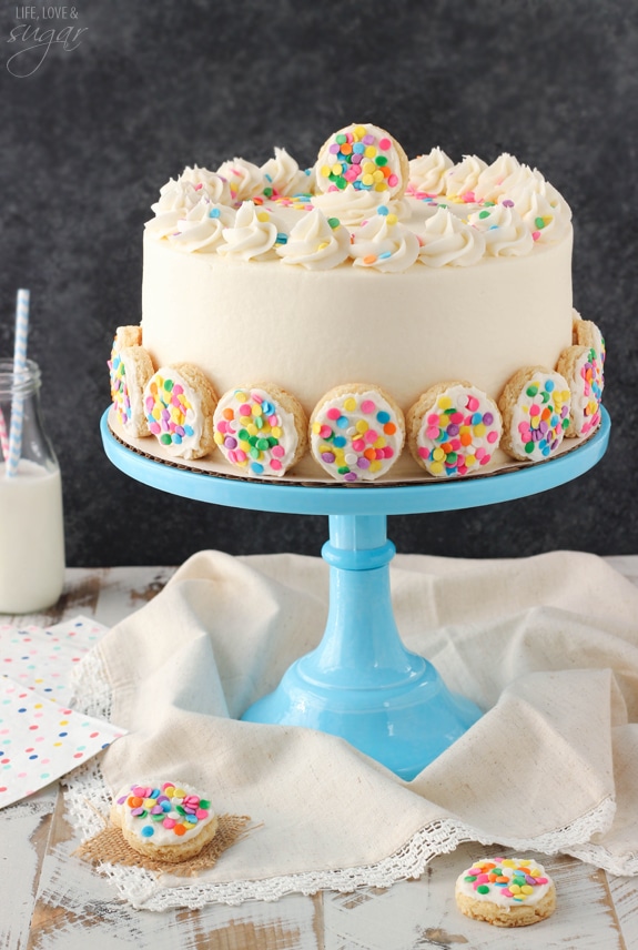 BAILEYS Frosted Vanilla Cookie Layer Cake on a blue cake stand