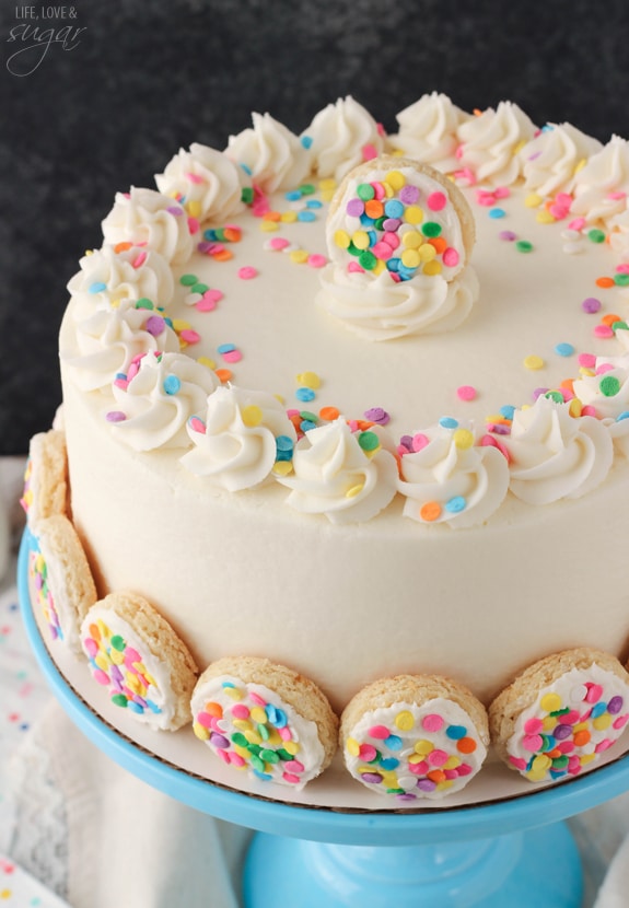 Overhead view of BAILEYS Frosted Vanilla Cookie Layer Cake on a blue cake stand