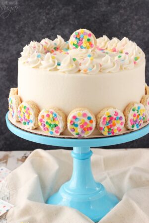 Baileys Frosted Vanilla Cookie Layer Cake on blue stand