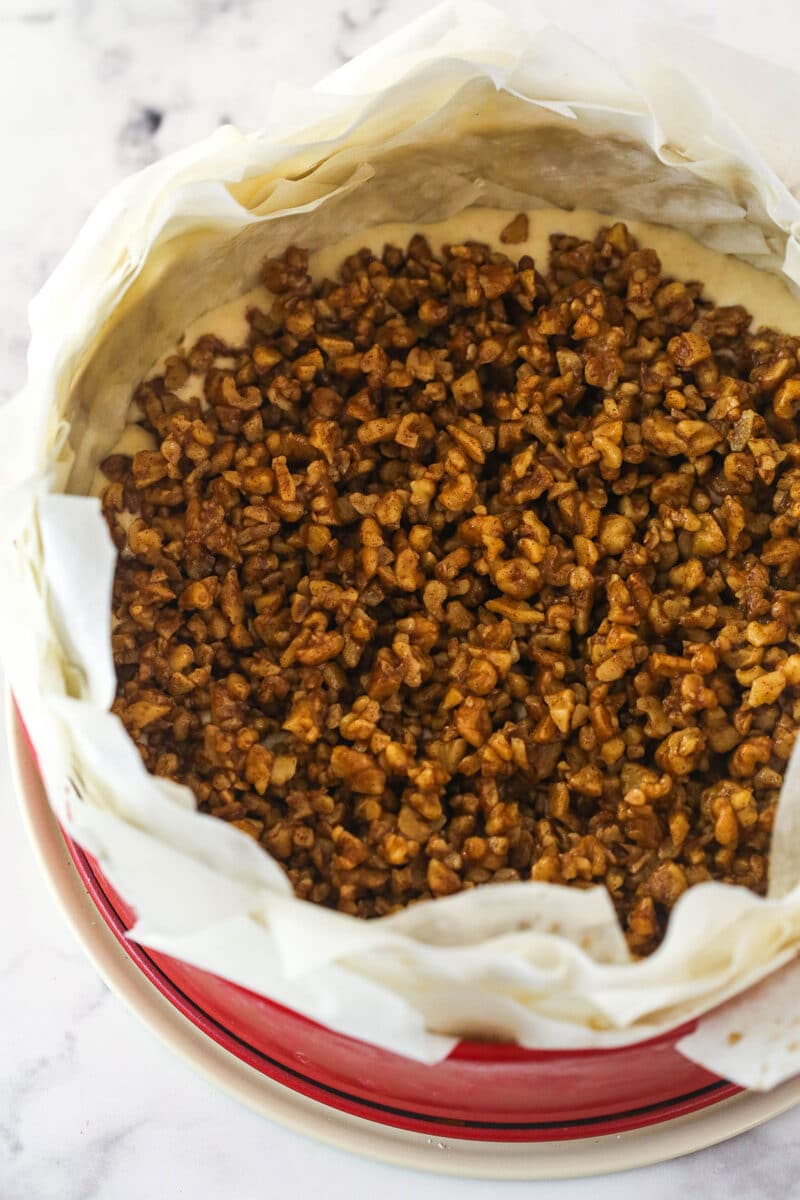 With a phyllo dough crust, creamy cheesecake filling, and honey walnut topping, Baklava Cheesecake is a fun twist on the traditional dessert. Walnut Filling added to cheesecake filling in a phyllo dough crust