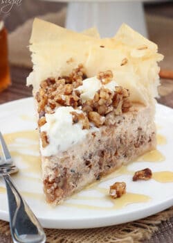 Baklava Cheesecake slice on white plate close up
