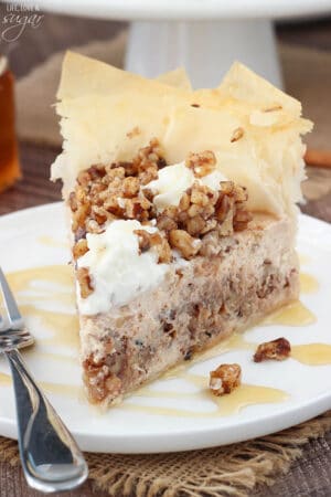 Baklava Cheesecake slice on white plate close up