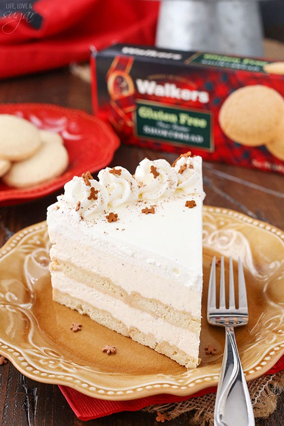 Sliced of layered eggnog icebox cake on an orange plate.