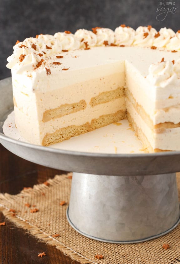 Icebox cake on a stand with a slice taken out