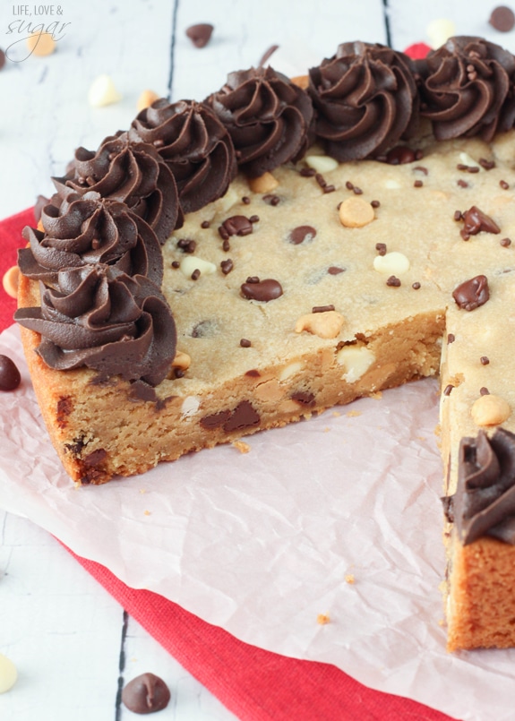 Triple Chocolate Chip Cookie Cake with a slice removed