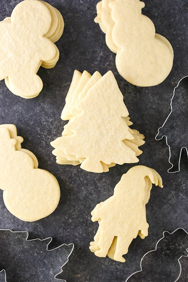 Cut out sugar cookies in holiday shapes.