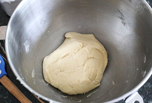 Stainless steel bowl with sugar cookie dough