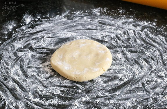 Floured counter with sugar cookie dough