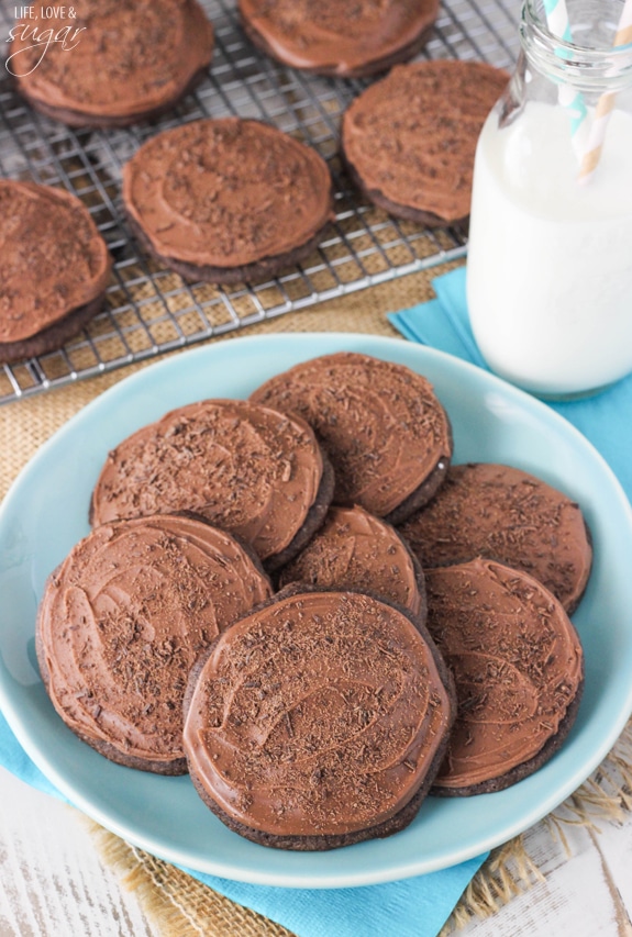 Grandfather's Favorite Chocolate Cookies on a blue plate next to a cooling rack