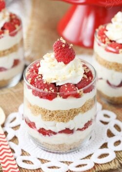 close up of Raspberry Amaretto Cheesecake Trifle in a glass