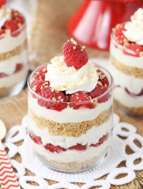 close up of Raspberry Amaretto Cheesecake Trifle in a glass