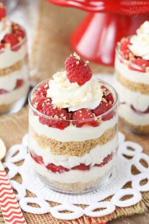 close up of Raspberry Amaretto Cheesecake Trifle in a glass