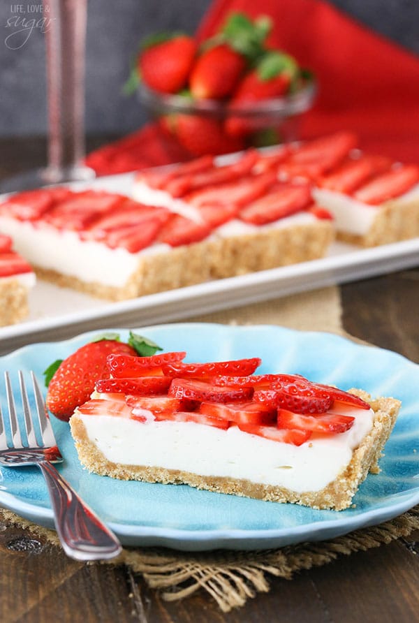 Strawberry Champagne Tart slice on a blue plate
