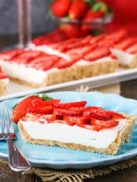 Strawberry bake strawberry tart slice on a blue plate