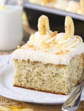 Banana Cake with Cream Cheese Frosting slice on white plate