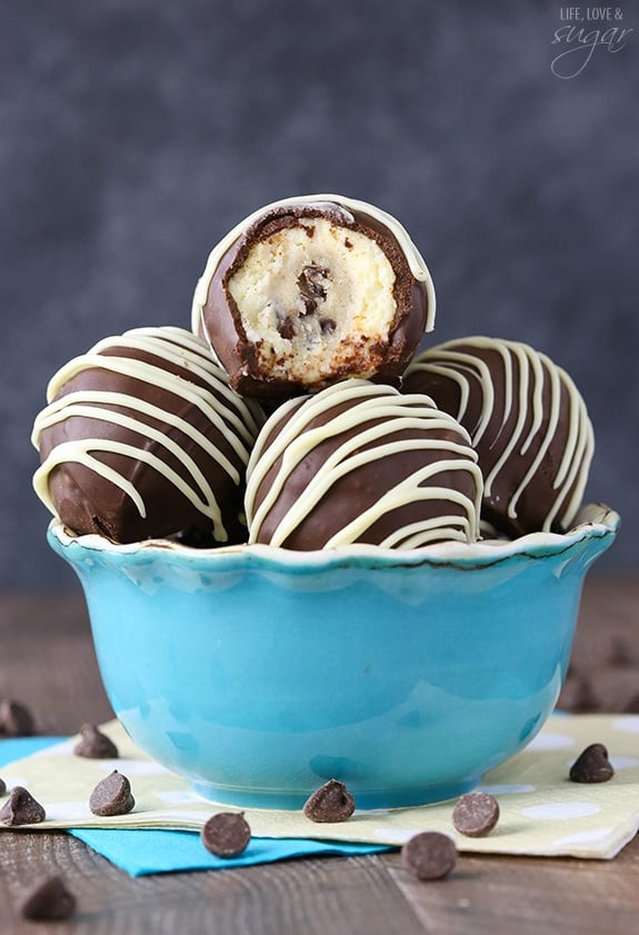 Chocolate Chip Cookie Dough Cheesecake Balls - eggless cookie dough surrounded by vanilla cheesecake! All dipped in chocolate! So good!