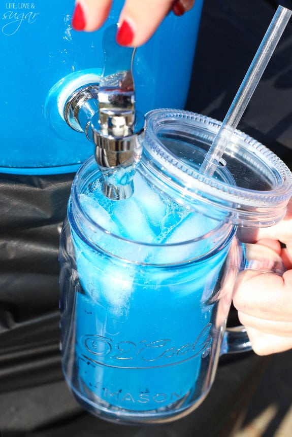 Carolina Panther Punch being poured in a mason jar glass