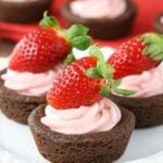 Strawberry Cheesecake Chocolate Cookie Cups on a plate