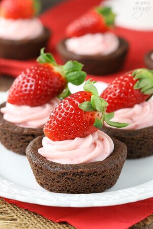 Strawberry Cheesecake Chocolate Cookie Cups on a plate
