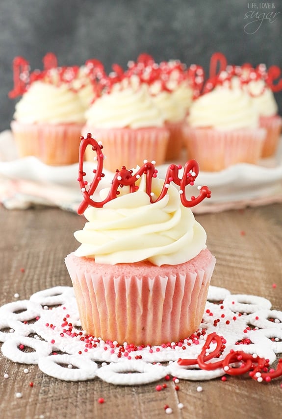 Strawberry Cupcakes with Cream Cheese Frosting - the love toppers make them the perfect treat for Valentine's Day!