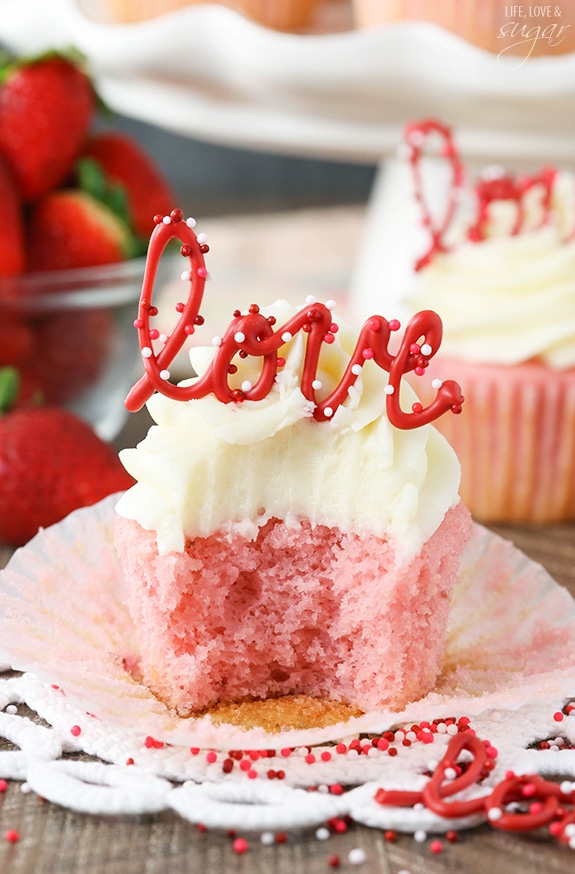 image of Strawberry Cupcake with Cream Cheese Frosting with bite taken out