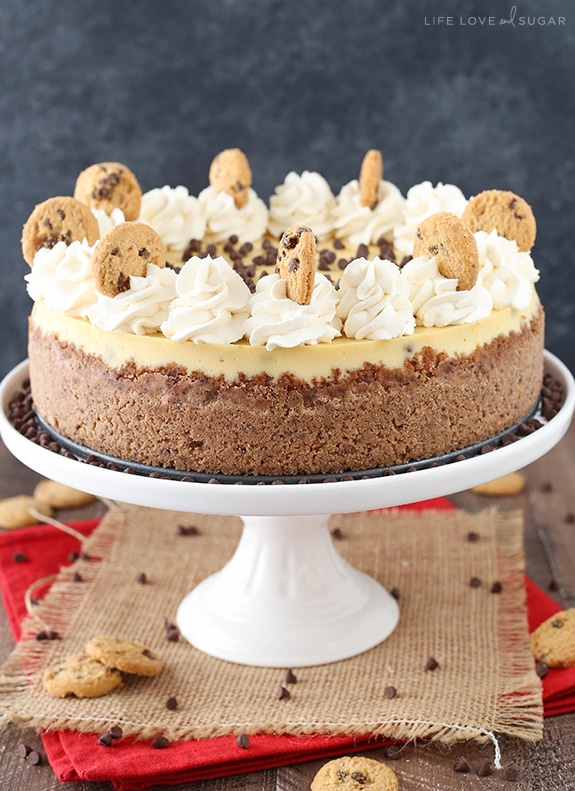 Chocolate Chip Shortbread Cheesecake on a white cake stand