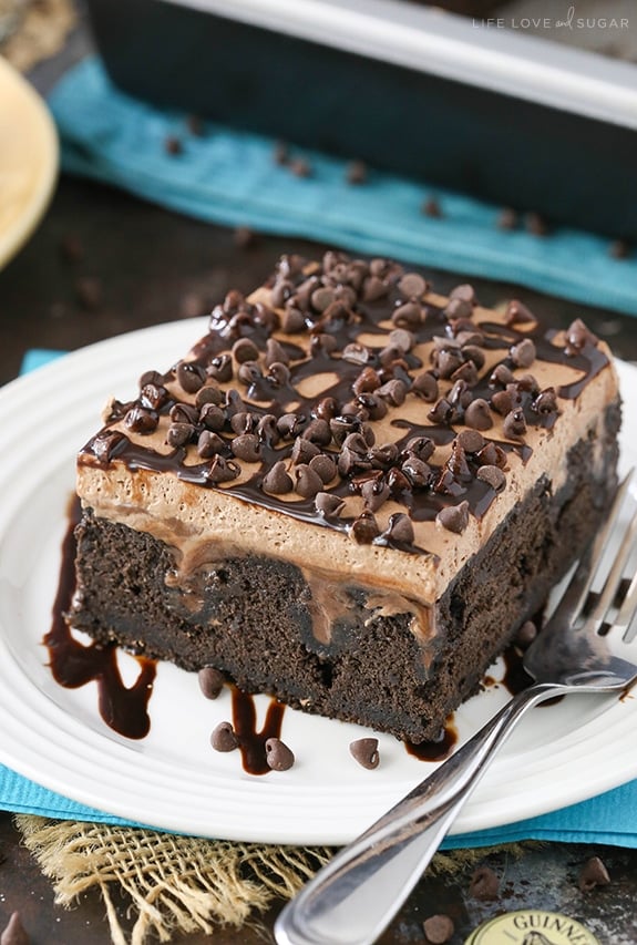 Guinness Chocolate Poke Cake slice on a plate